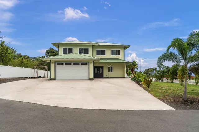 a view of swimming pool in a backyard