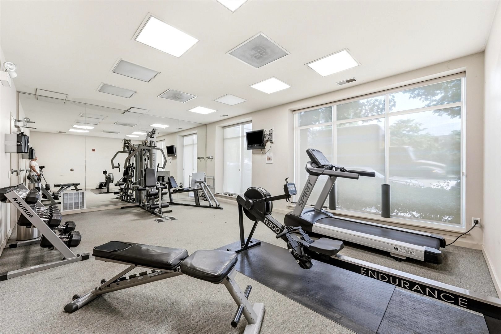 1155 West Roosevelt Road, Unit 404 Chicago, IL 60608 - Photo 24 of 30 a view of a room with gym equipment