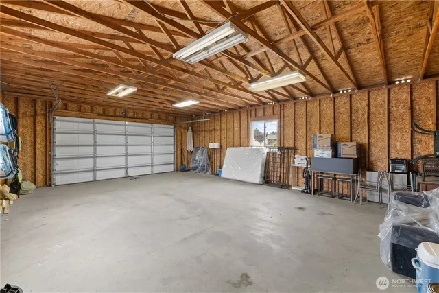 a view of a livingroom with furniture and a chandelier