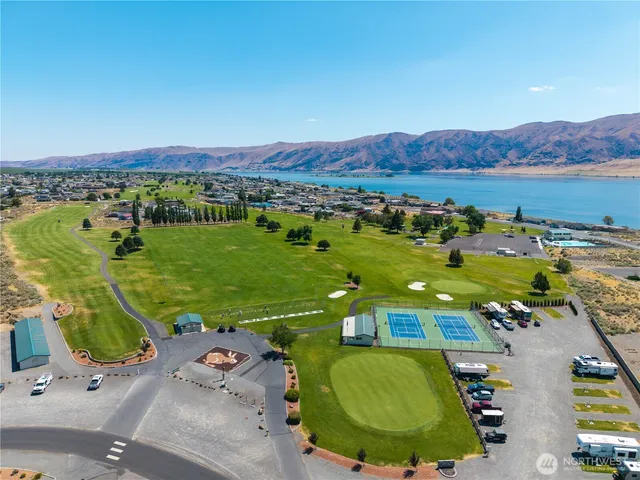 an aerial view of a house with a garden