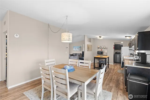 a view of a dining room with furniture