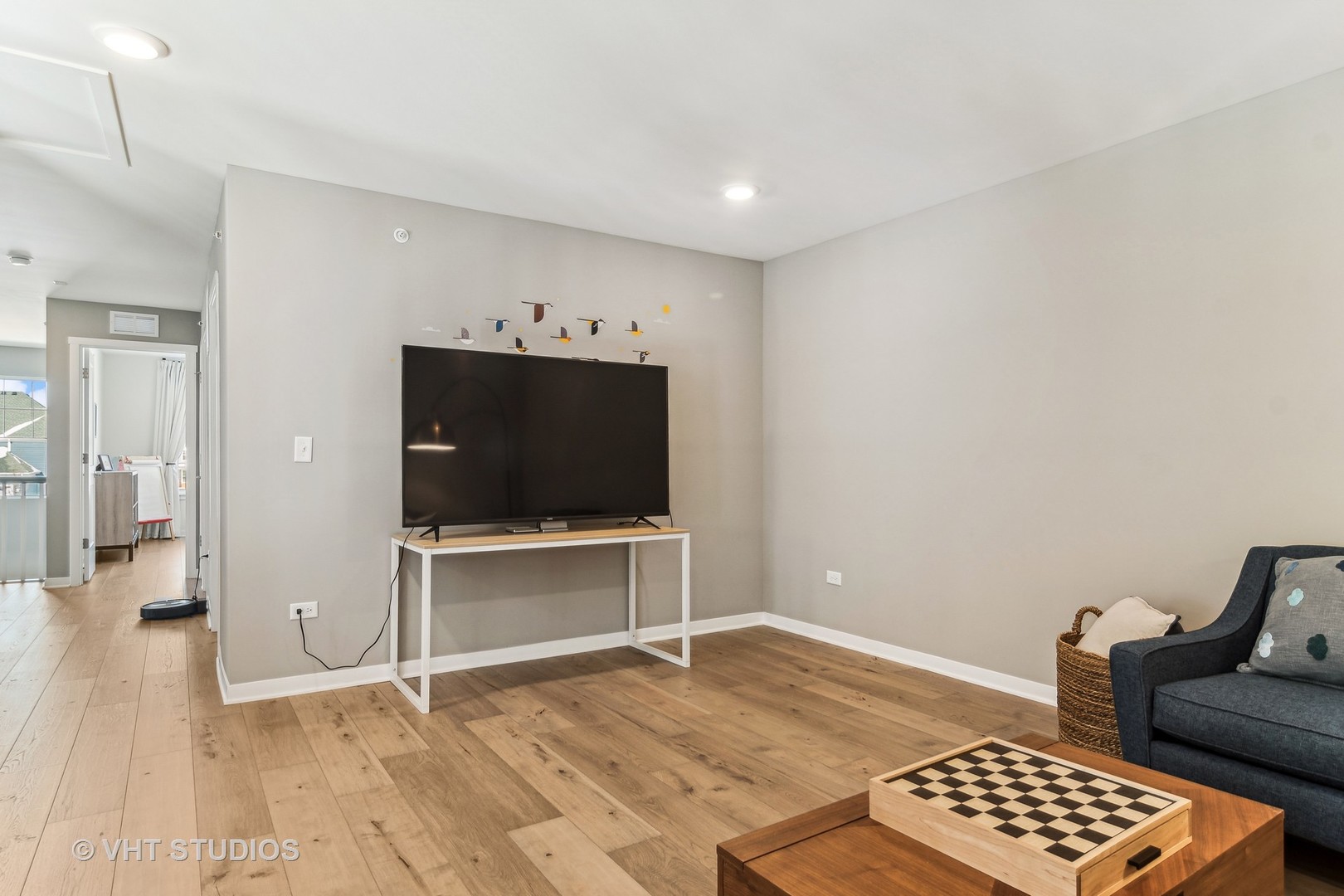 253 Hoffman Drive Buffalo Grove, IL 60089 - Photo 11 of 32 a view of room with wooden floor and furniture