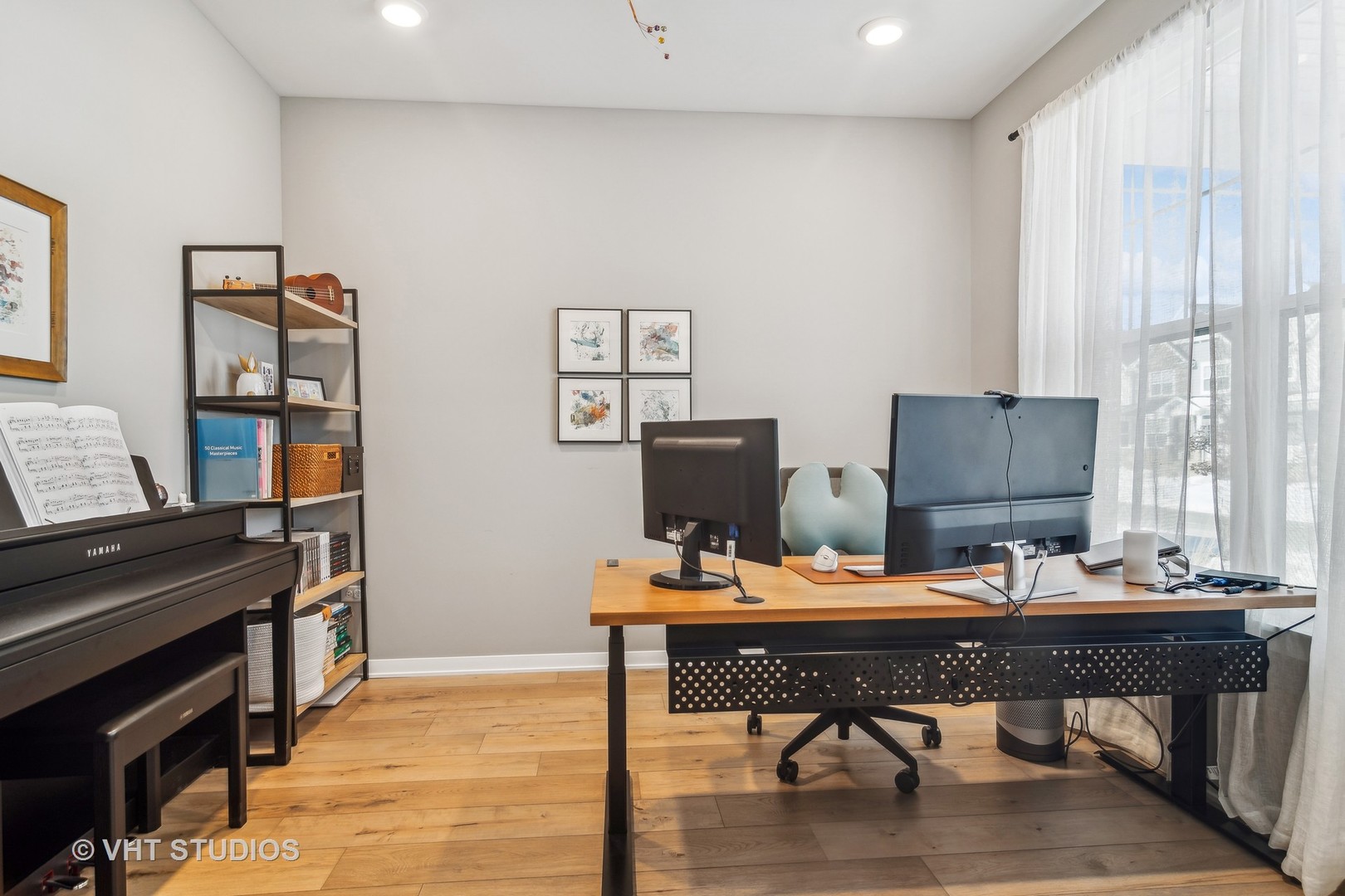 253 Hoffman Drive Buffalo Grove, IL 60089 - Photo 12 of 32 a view of a workspace with furniture and a window