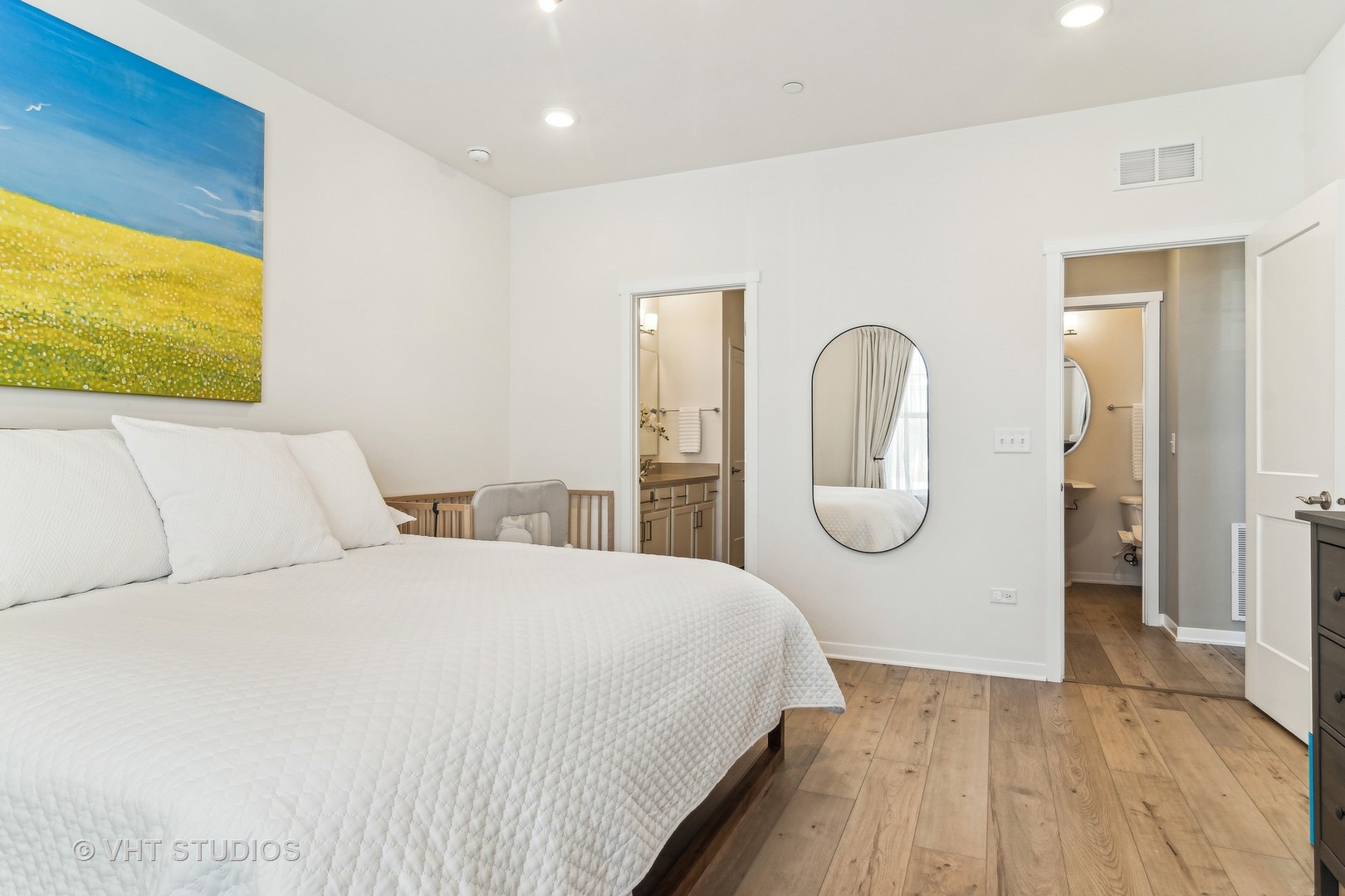 253 Hoffman Drive Buffalo Grove, IL 60089 - Photo 13 of 32 a bedroom with bed and a painting