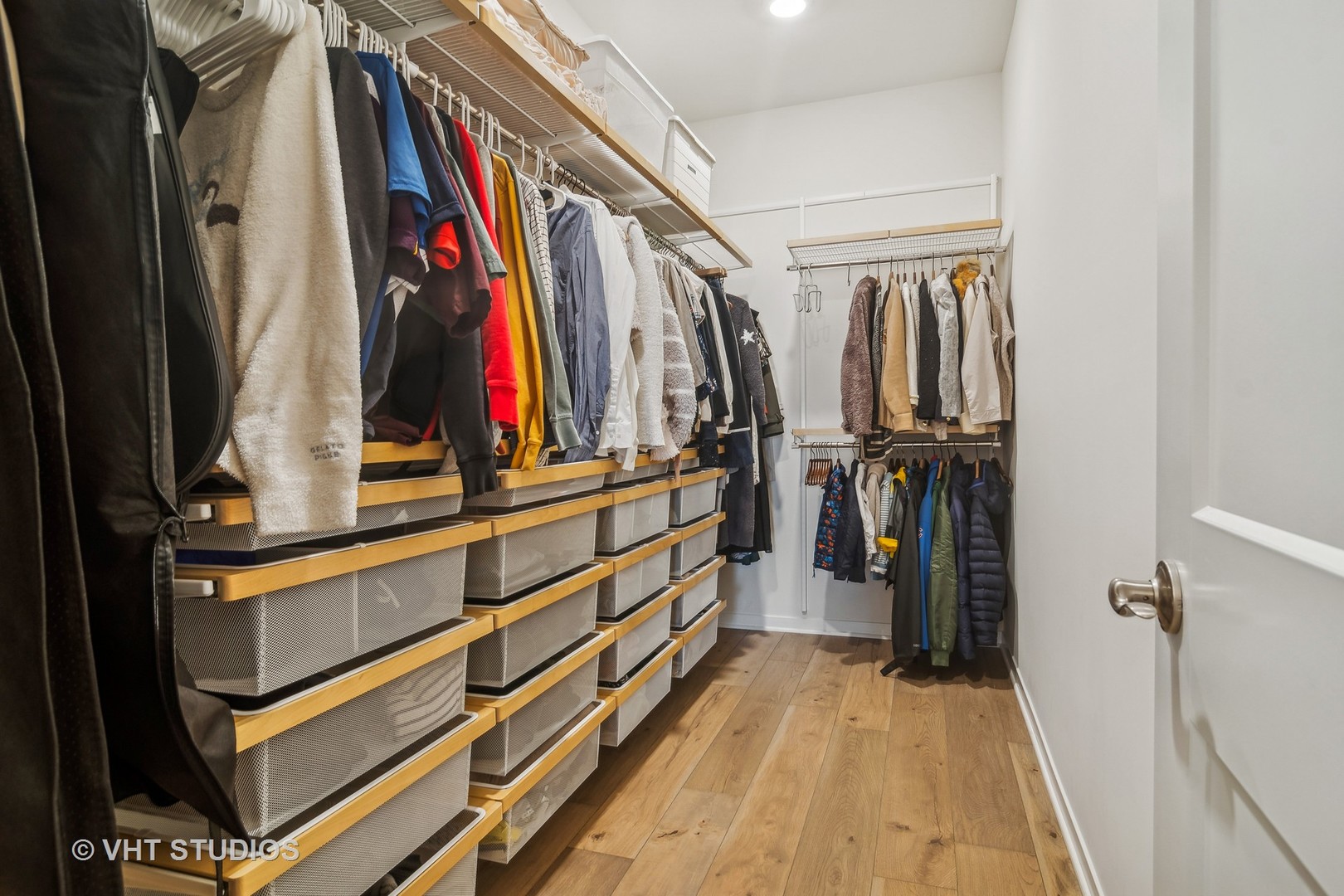 253 Hoffman Drive Buffalo Grove, IL 60089 - Photo 15 of 32 a view of walk in closet with clothes and shoes