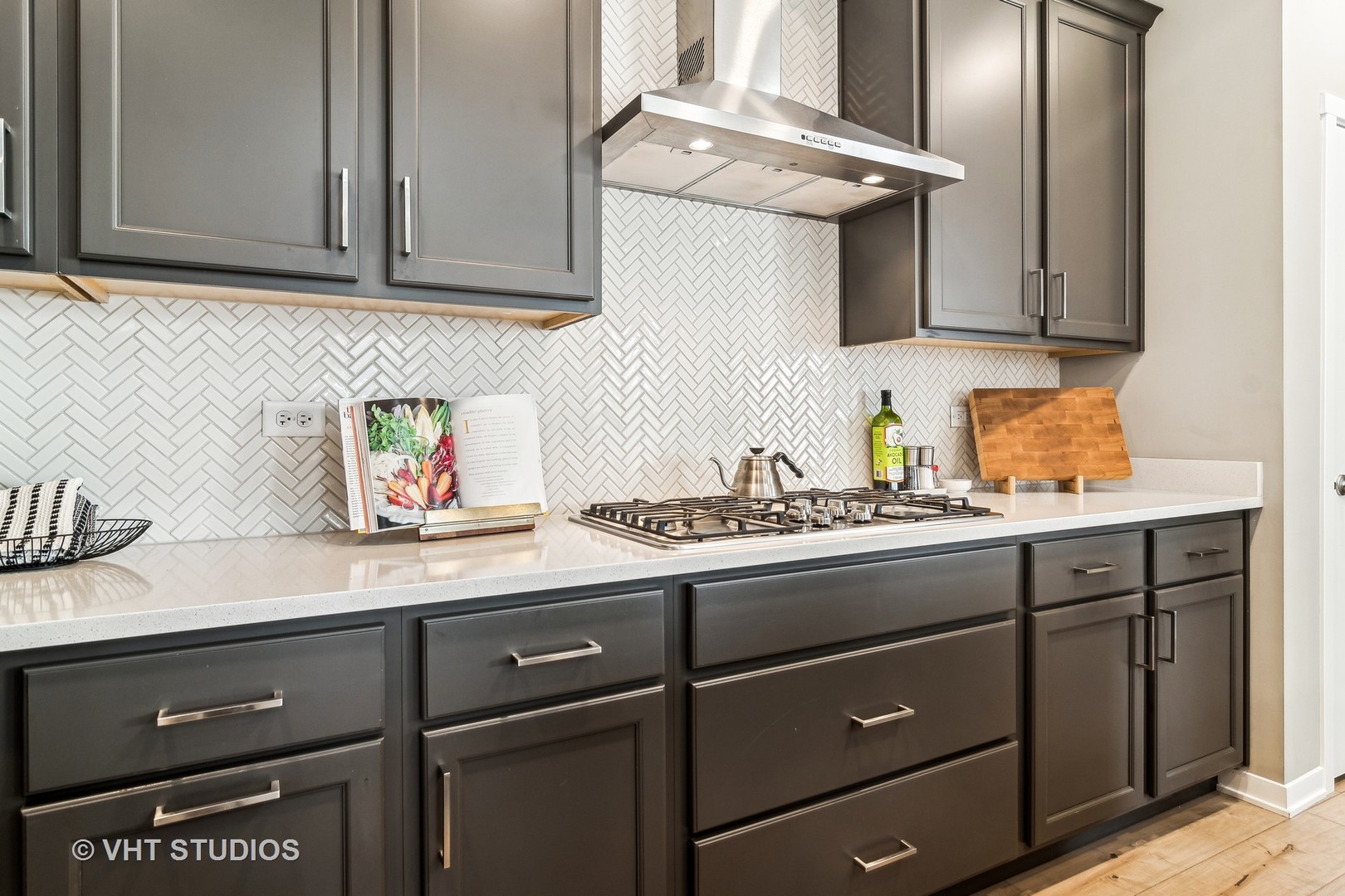 253 Hoffman Drive Buffalo Grove, IL 60089 - Photo 6 of 32 a kitchen with stainless steel appliances granite countertop a sink a stove and cabinets