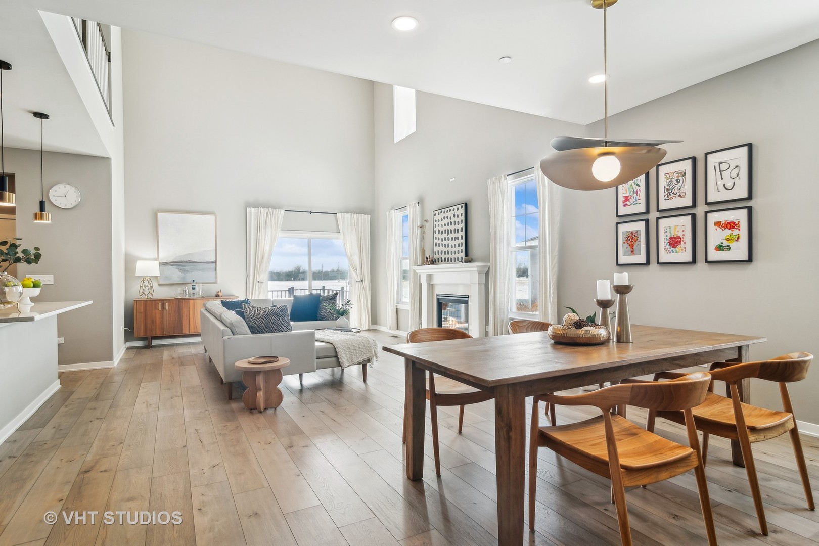 253 Hoffman Drive Buffalo Grove, IL 60089 - Photo 9 of 32 a view of a dining room with furniture window and wooden floor