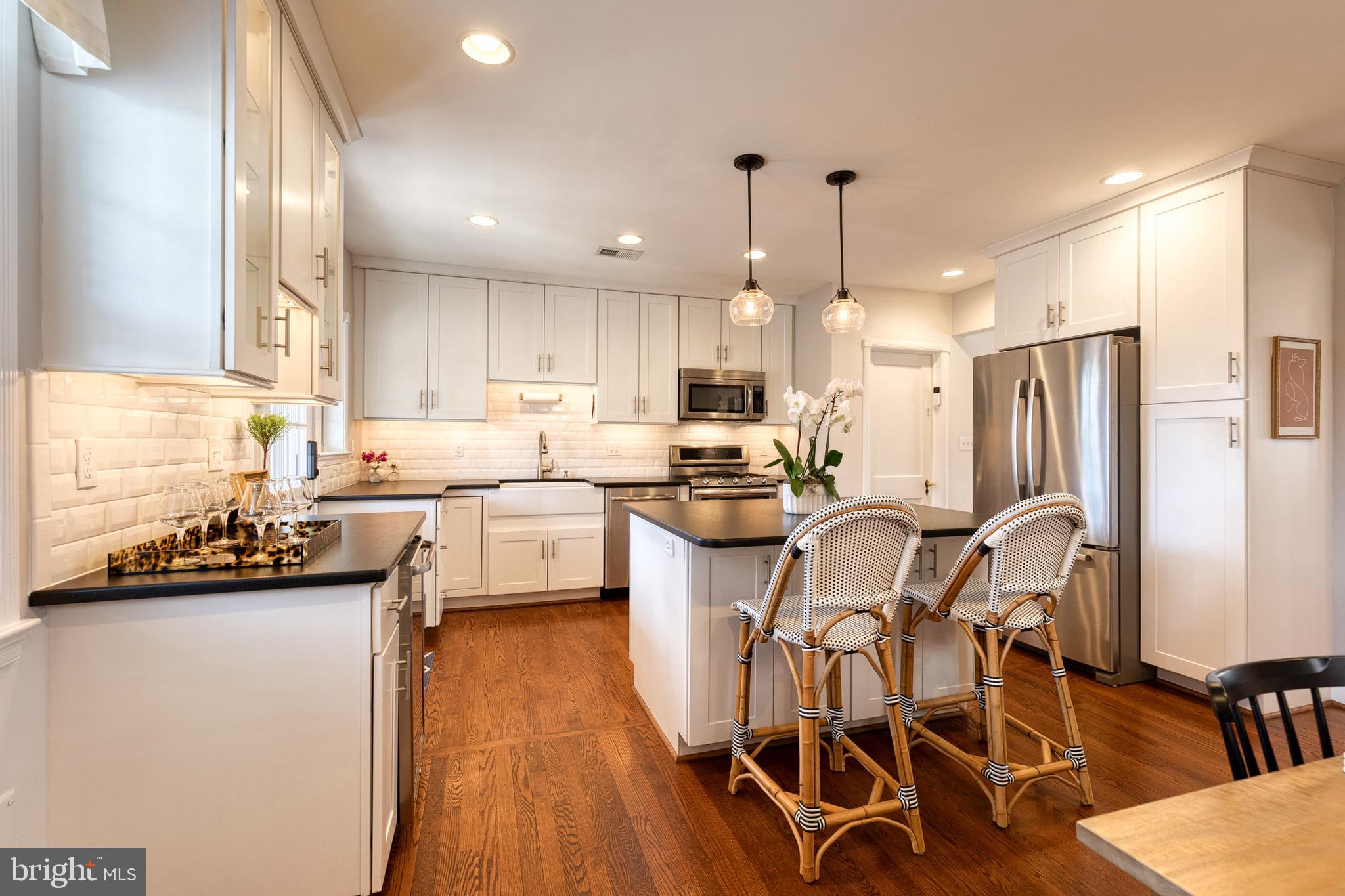 45 Dunkirk Road Baltimore, MD 21212 - Photo 21 of 45 a kitchen with a sink appliances and cabinets