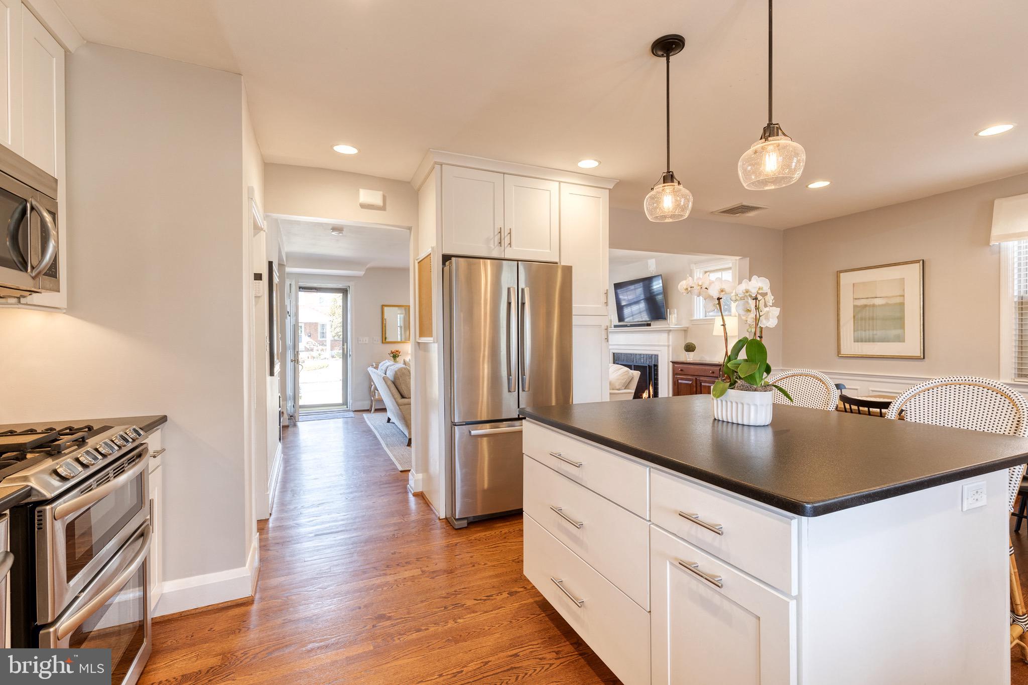 45 Dunkirk Road Baltimore, MD 21212 - Photo 25 of 45 a kitchen with stainless steel appliances granite countertop a refrigerator a sink and a stove