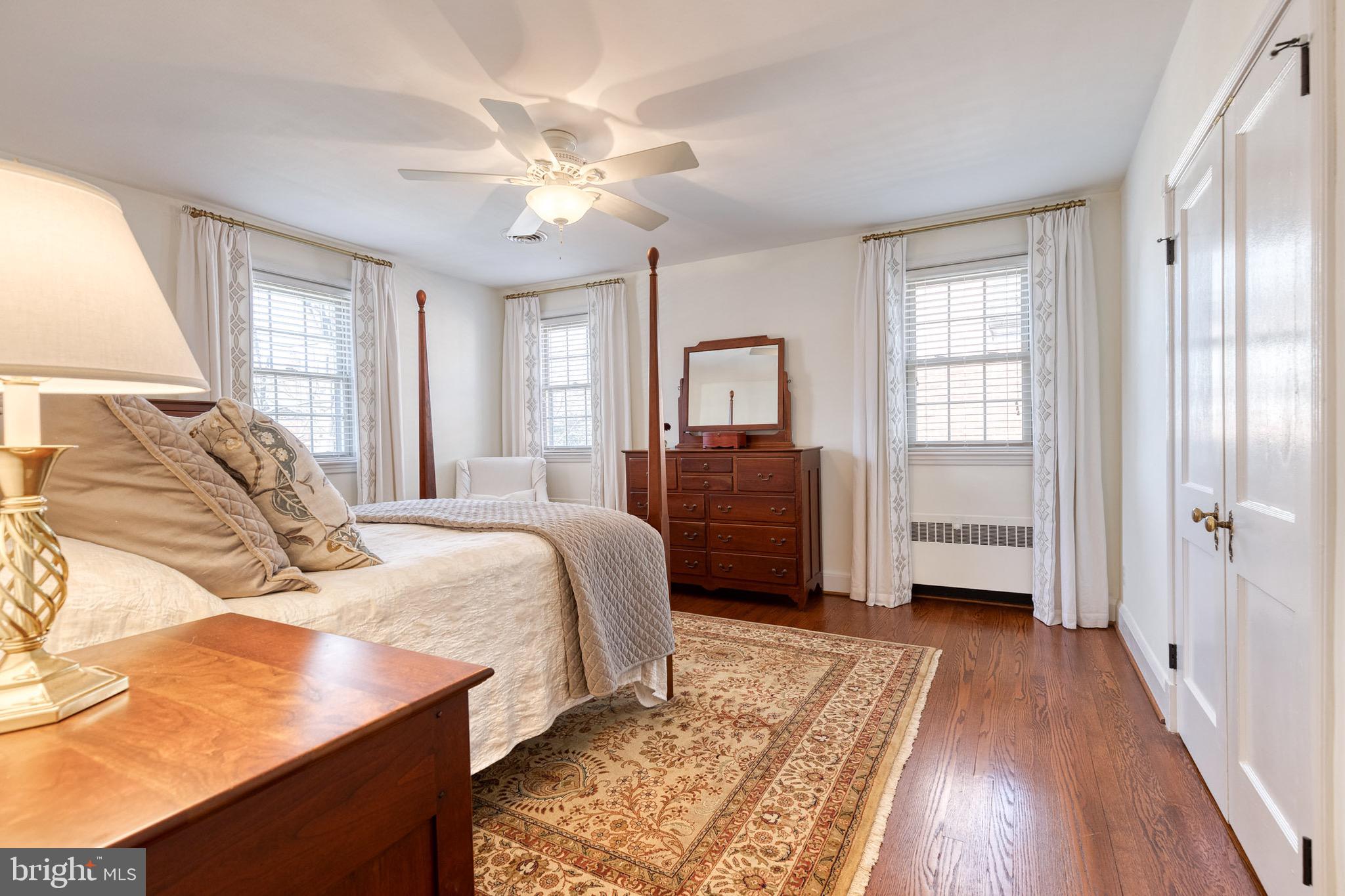 45 Dunkirk Road Baltimore, MD 21212 - Photo 27 of 45 a spacious bedroom with a bed and a chandelier