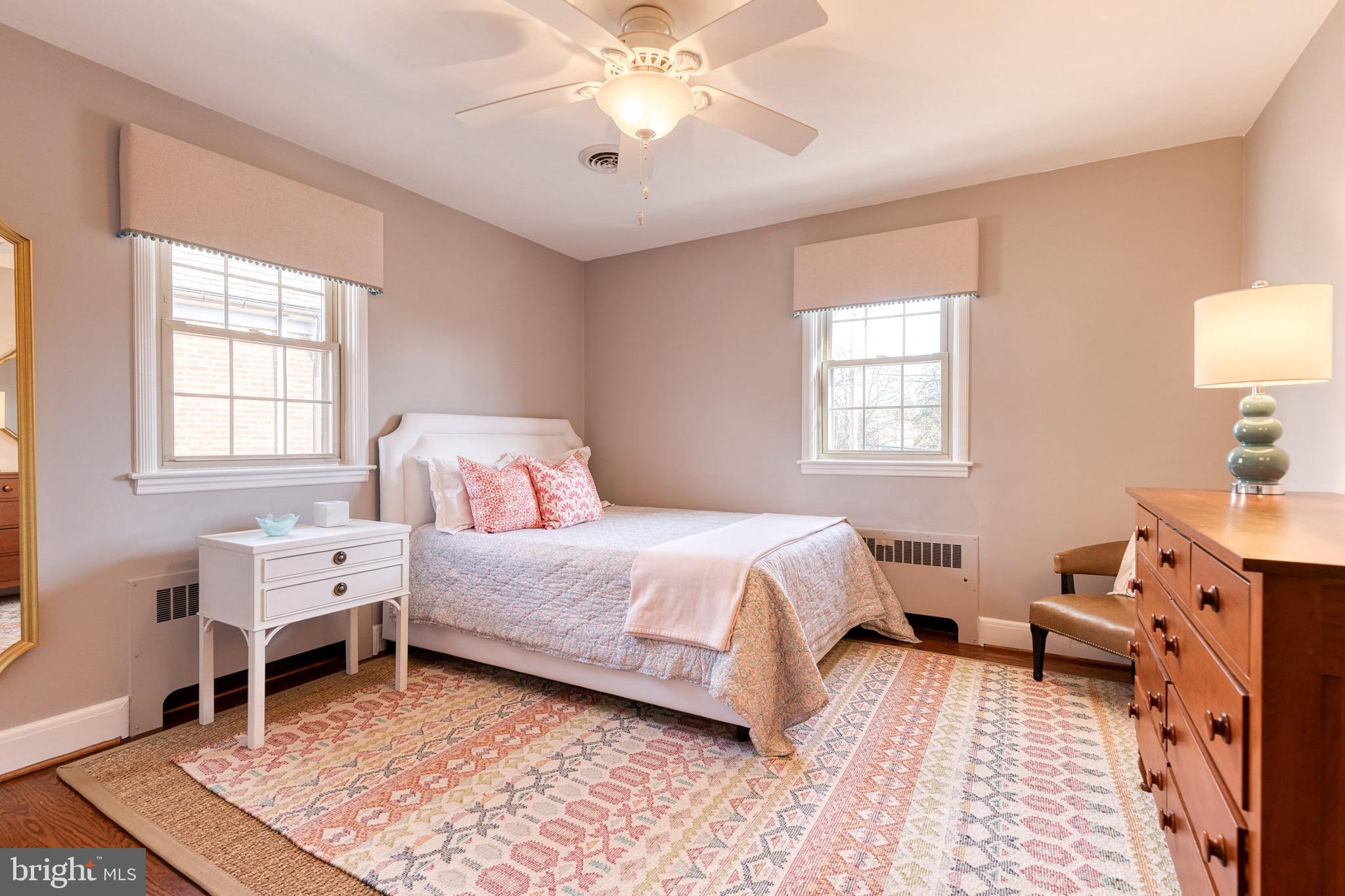 45 Dunkirk Road Baltimore, MD 21212 - Photo 32 of 45 a bedroom with a bed and a chandelier