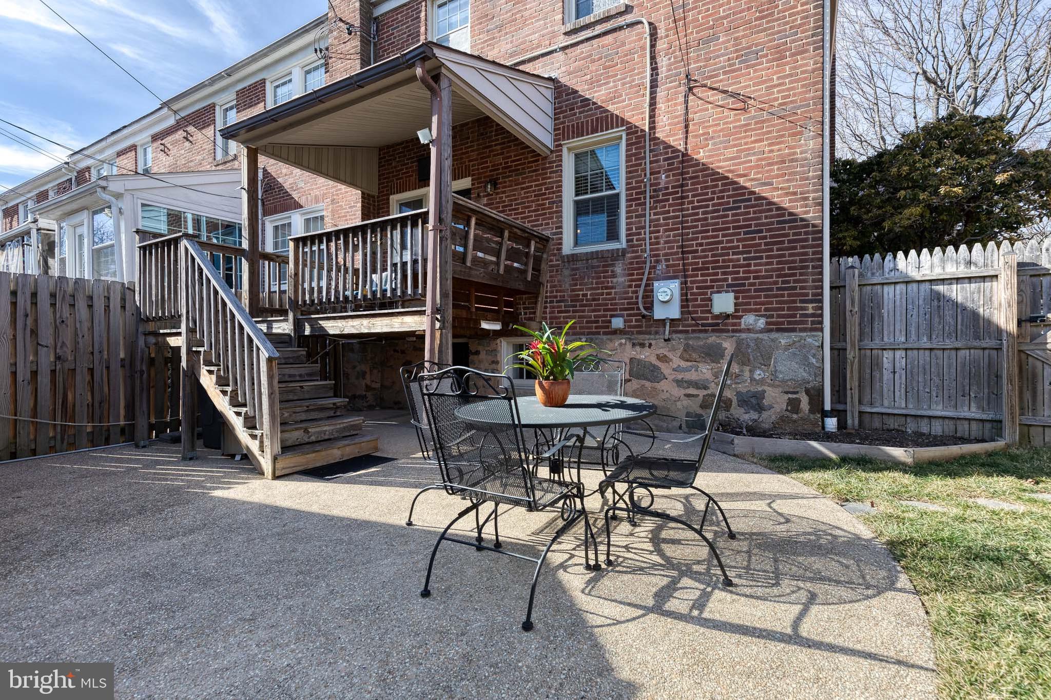 45 Dunkirk Road Baltimore, MD 21212 - Photo 43 of 45 a view of a chair and table in backyard