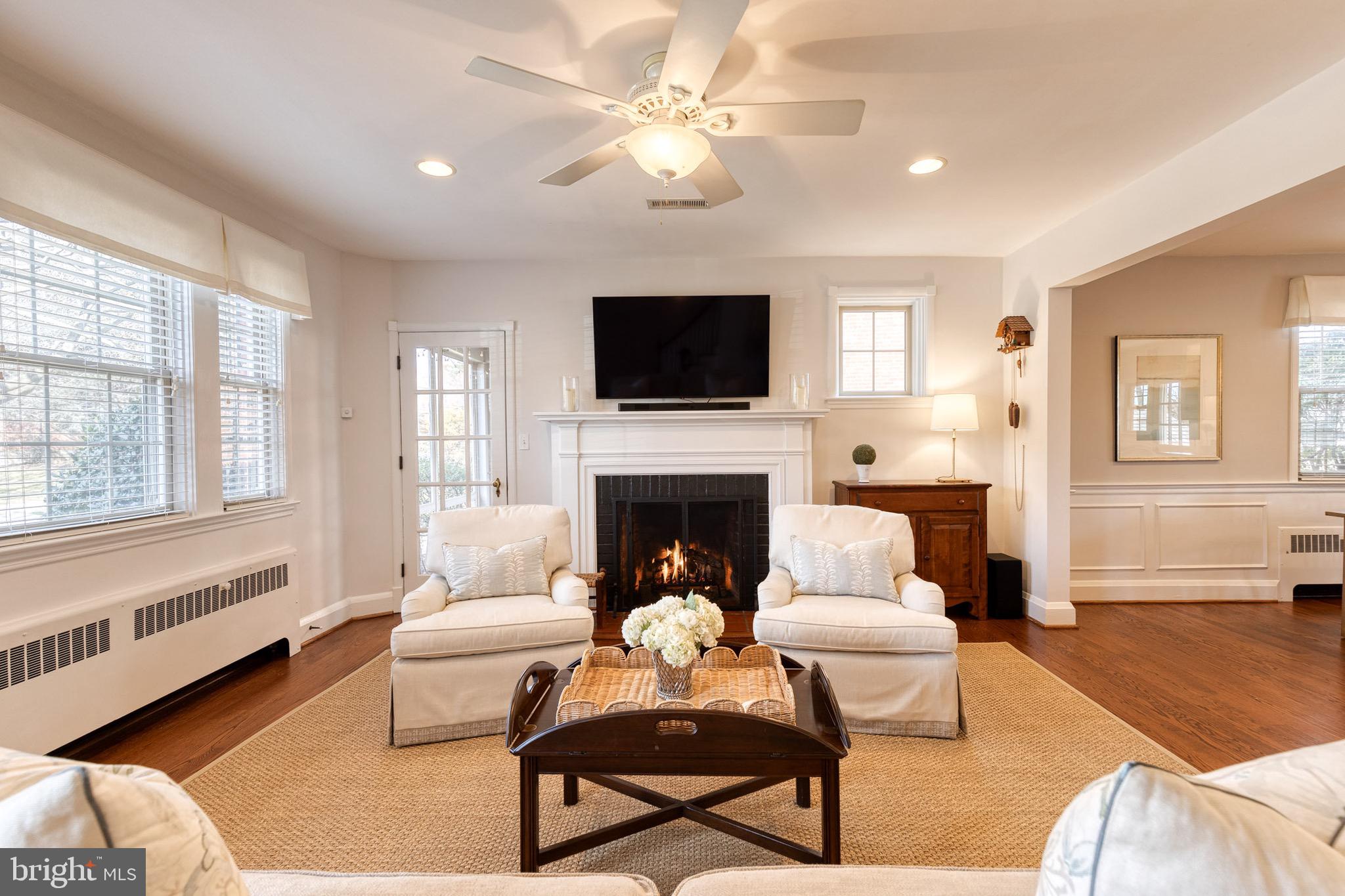 45 Dunkirk Road Baltimore, MD 21212 - Photo 6 of 45 a living room with furniture a flat screen tv and a fireplace