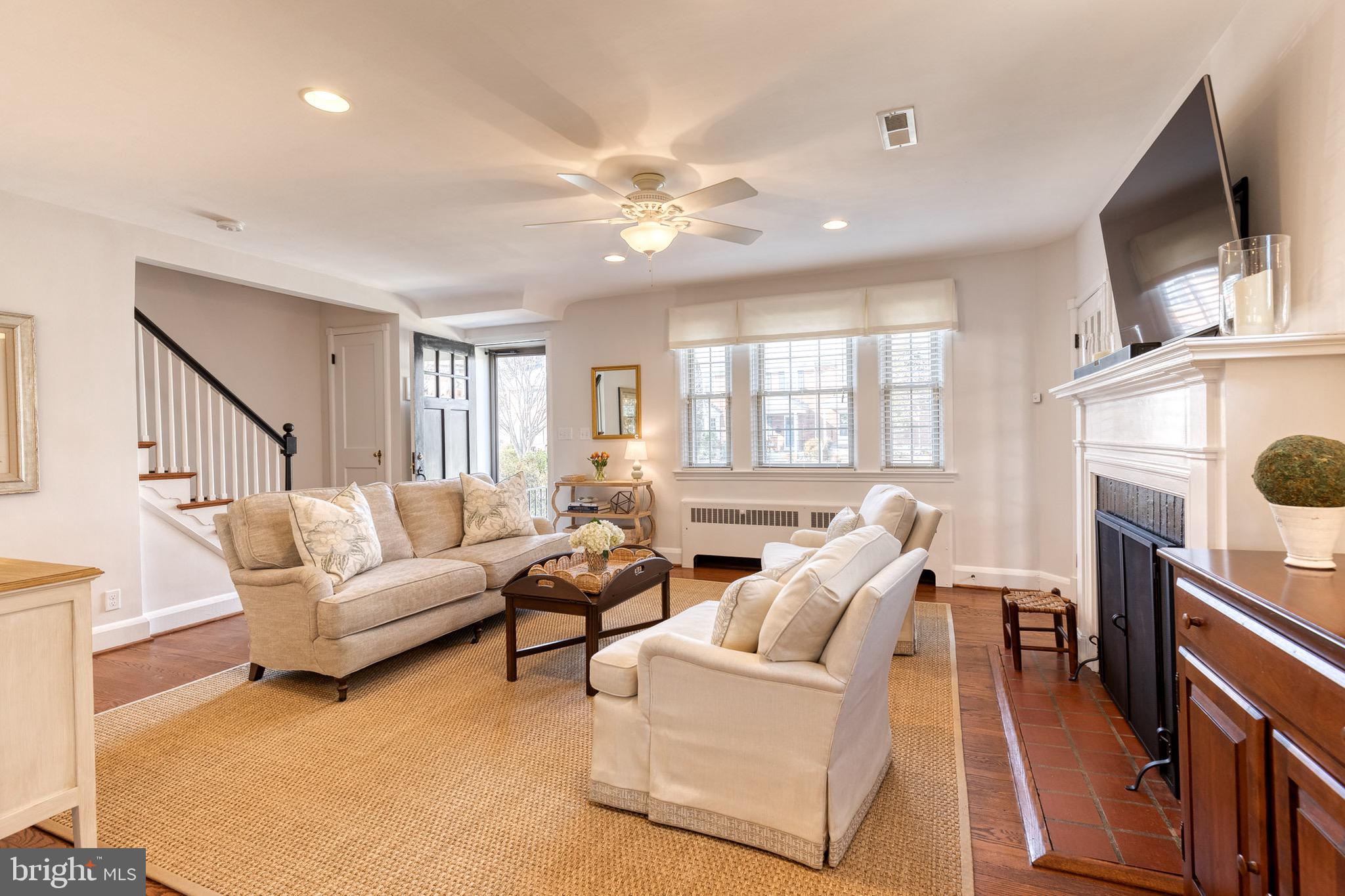 45 Dunkirk Road Baltimore, MD 21212 - Photo 10 of 45 a living room with fireplace furniture and a flat screen tv