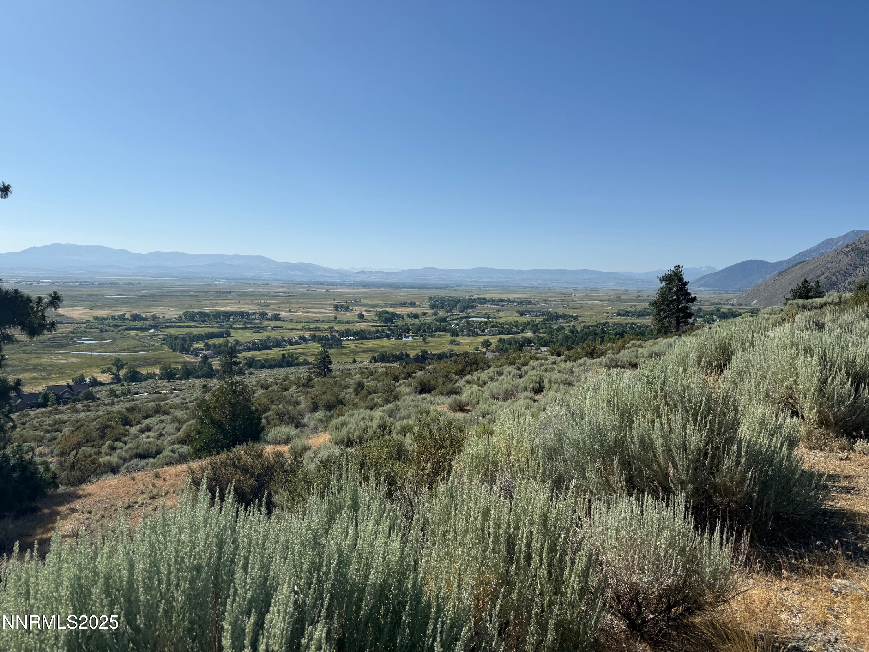 2592 Eagle Ridge Road, Unit 29 Genoa, NV 89411 - Photo 8 of 11 a view of a field with trees