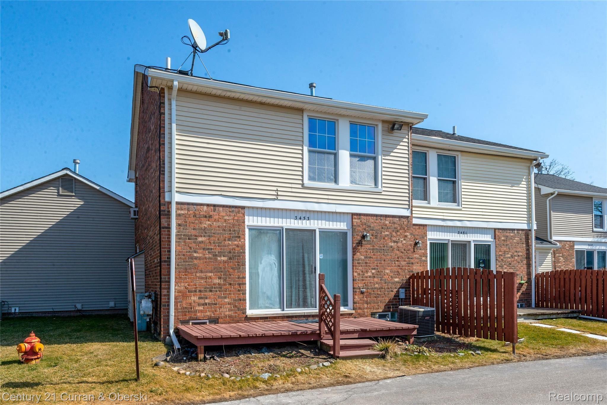 3453 Crooks Road, Unit 21 Royal Oak, MI 48073 - Photo 21 of 24 Rear exterior view