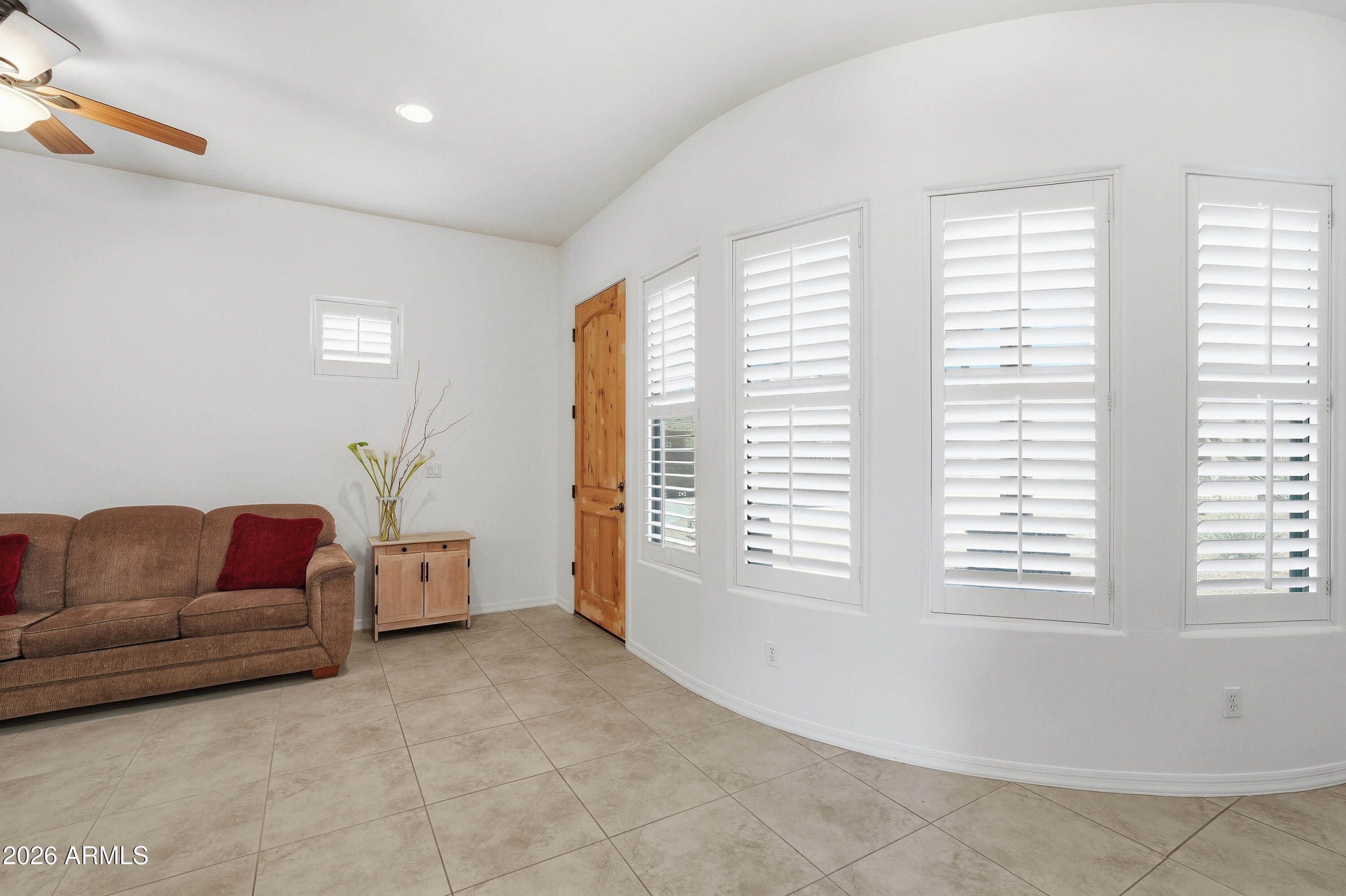 2616 West Canyon Road Phoenix, AZ 85086 - Photo 35 of 45 a living room with furniture and a window