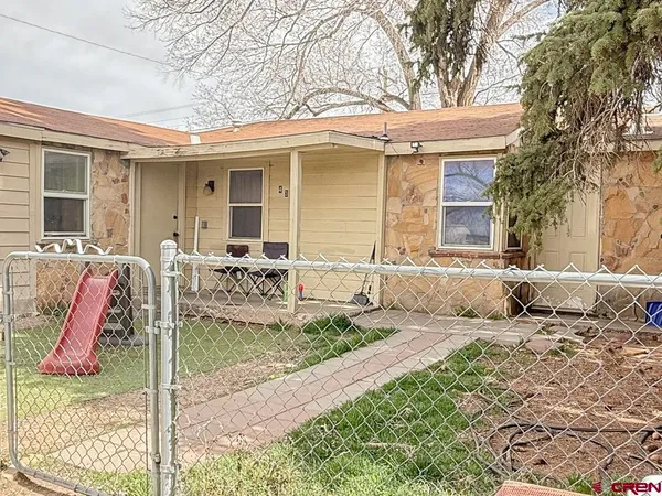 a front view of a house with patio