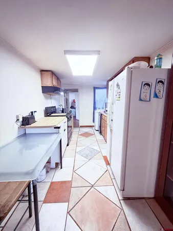 a view of livingroom with furniture and hardwood floor
