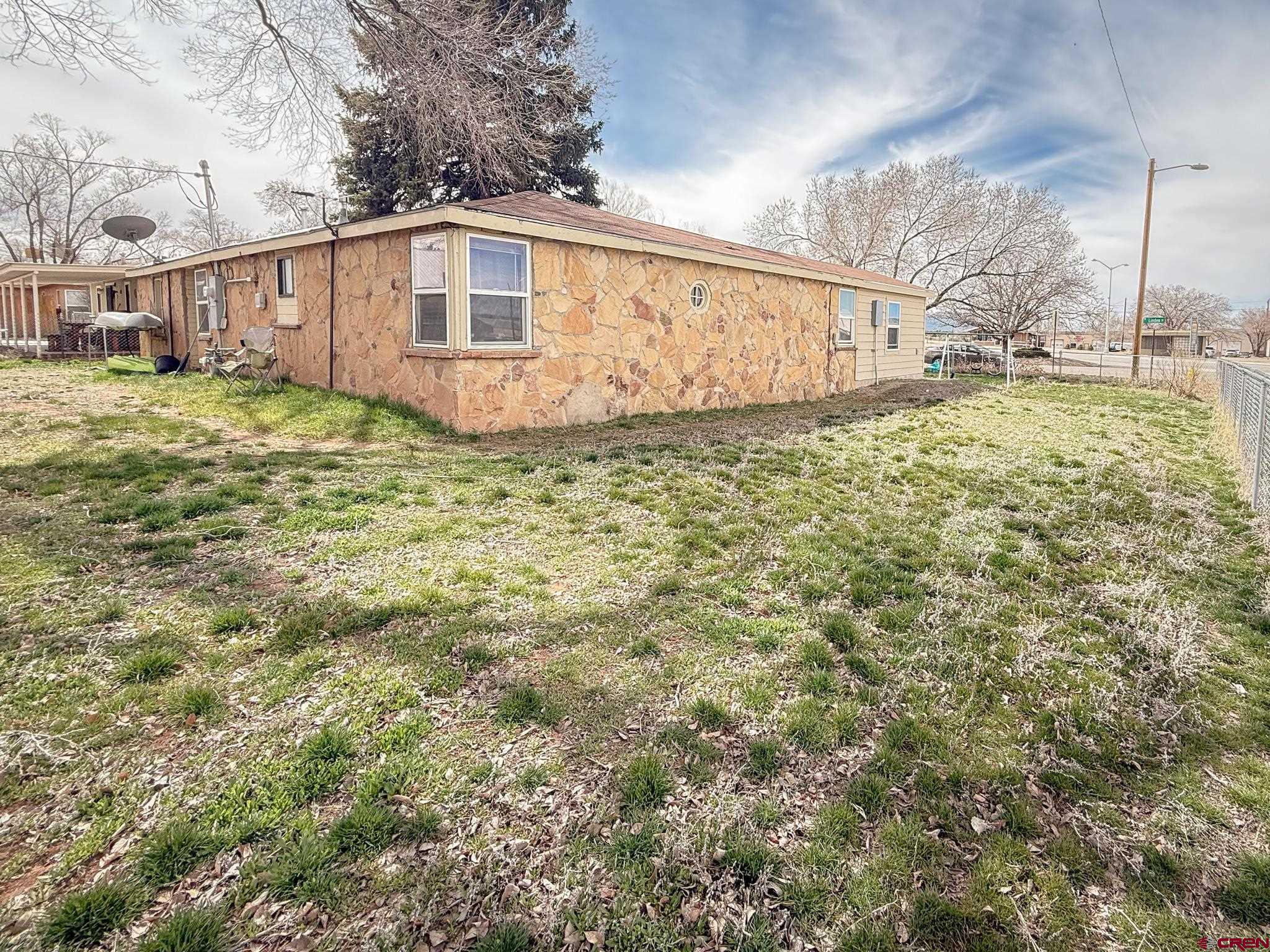 432 North Linden Street Cortez, CO 81321 - Photo 22 of 27 a view of a backyard of the house