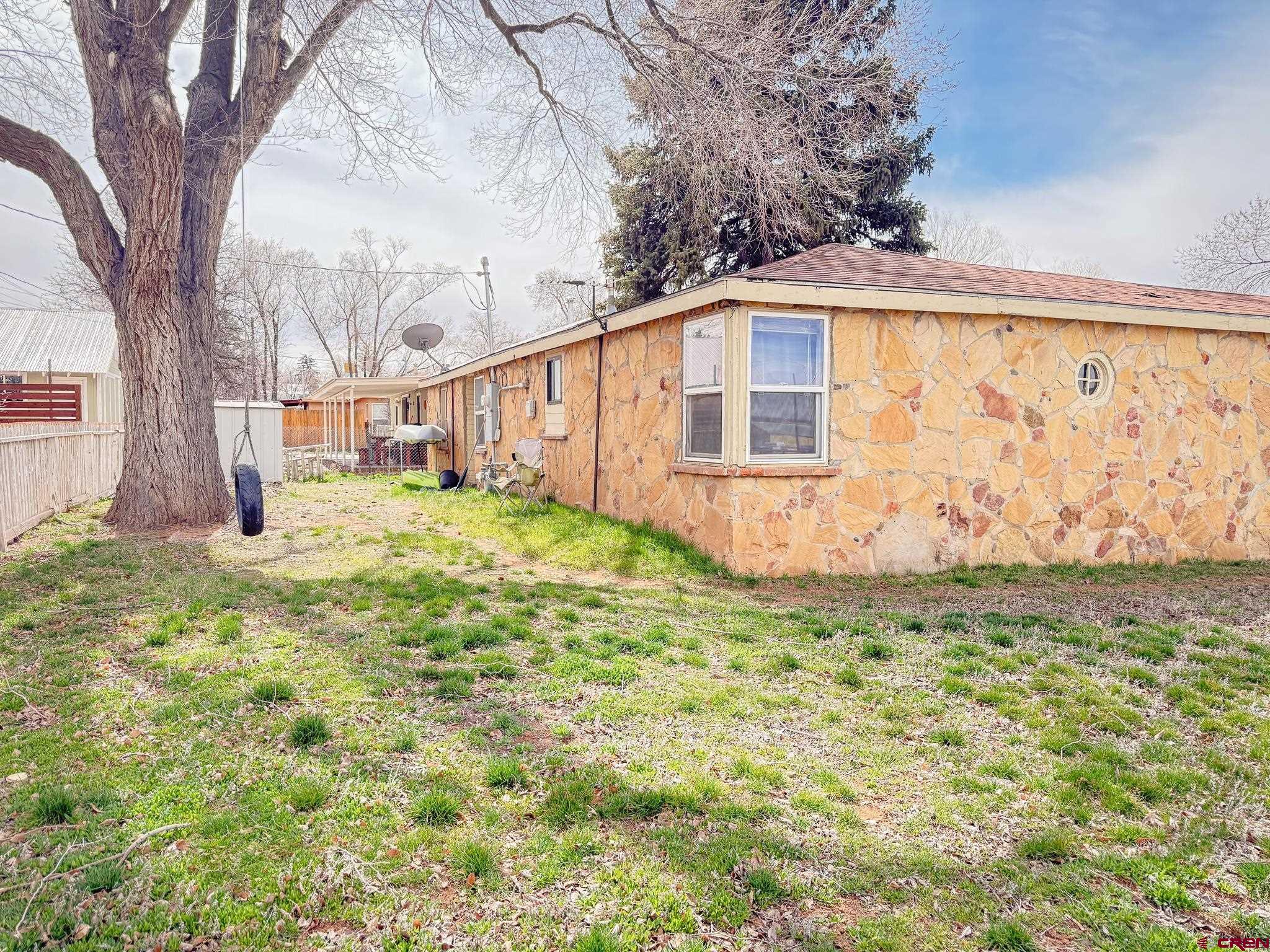 432 North Linden Street Cortez, CO 81321 - Photo 24 of 27 a front view of a house with garden