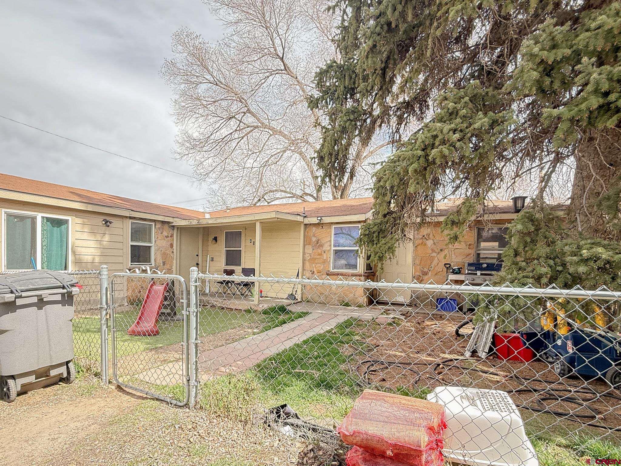432 North Linden Street Cortez, CO 81321 - Photo 26 of 27 a view of a house with backyard