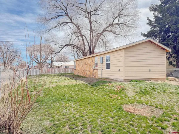 a front view of house with yard