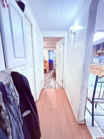 a view of livingroom with furniture and hardwood floor