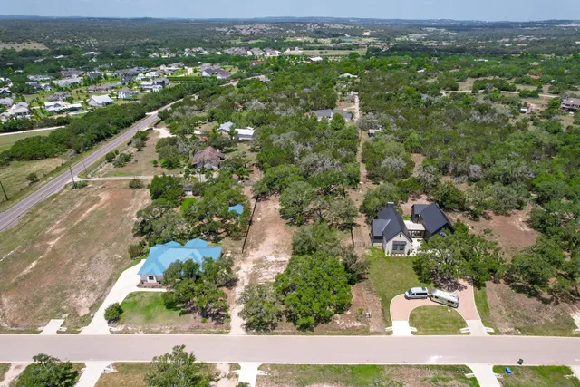 an aerial view of a city with lots of residential buildings