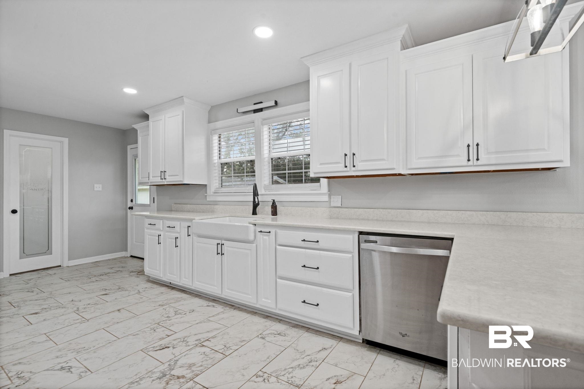 13461 Tom Gaston Road Mobile, AL 36695 - Photo 16 of 41 Kitchen with white cabinets, dishwasher, light marble finish flooring, recessed lighting, and light stone countertops