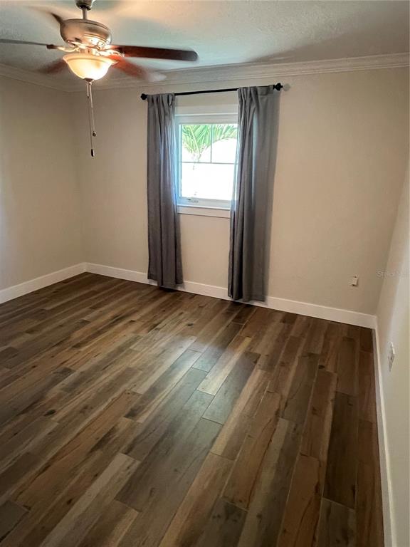 511 West Retta Esplanade Punta Gorda, FL 33950 - Photo 18 of 19 wooden floor in an empty room