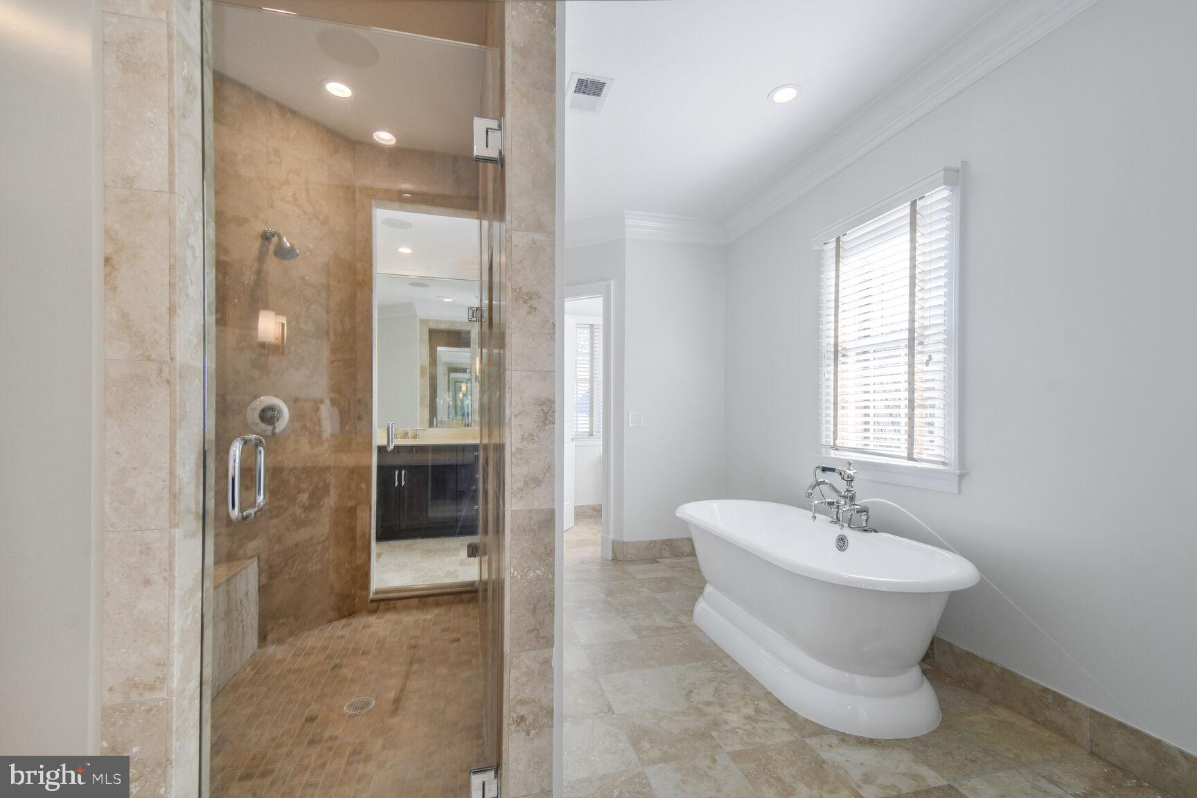 1935 Foxview Circle Northwest Washington, DC 20007 - Photo 26 of 52 a bathroom with a sink toilet and shower