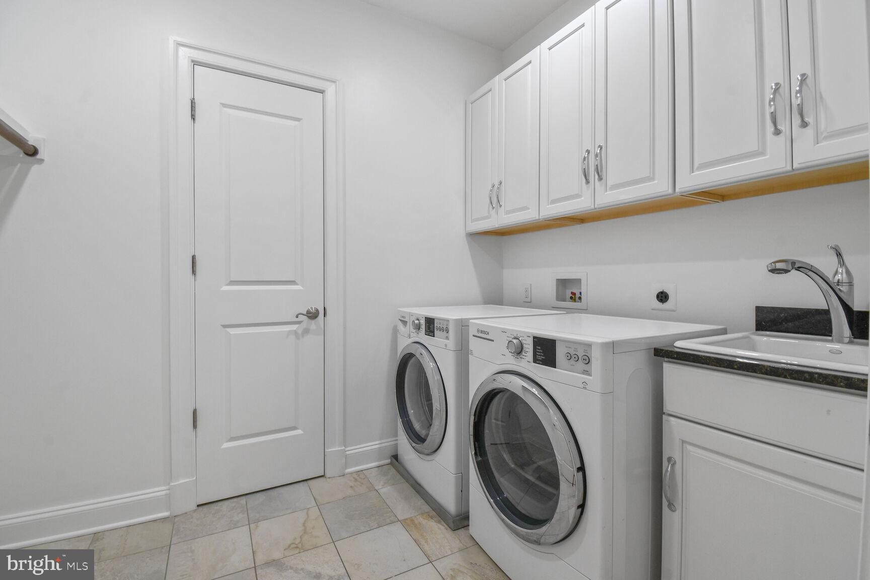 1935 Foxview Circle Northwest Washington, DC 20007 - Photo 28 of 52 a utility room with dryer and washer