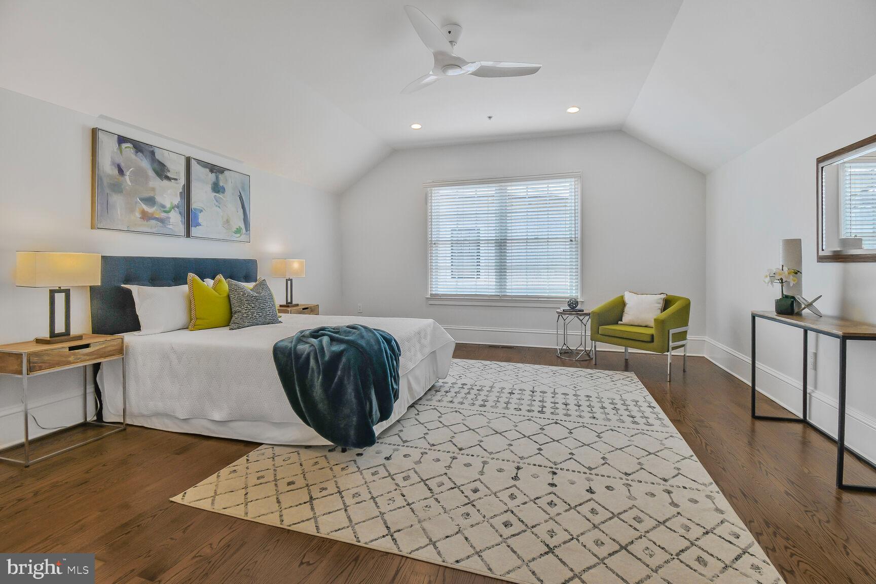 1935 Foxview Circle Northwest Washington, DC 20007 - Photo 36 of 52 a bedroom with a bed and wooden floor