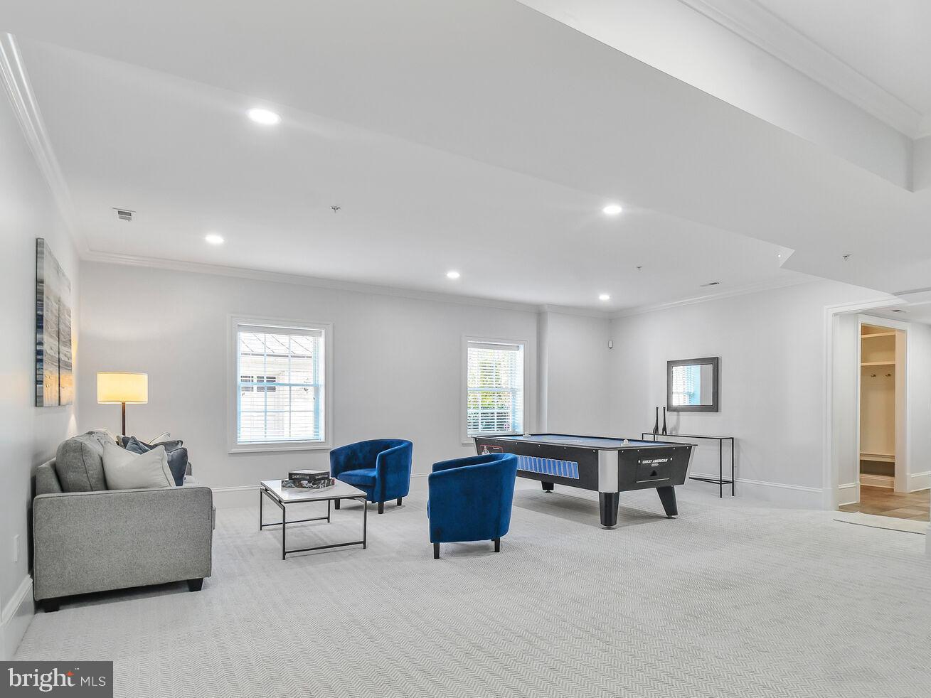 1935 Foxview Circle Northwest Washington, DC 20007 - Photo 44 of 52 a living room with furniture and a large window