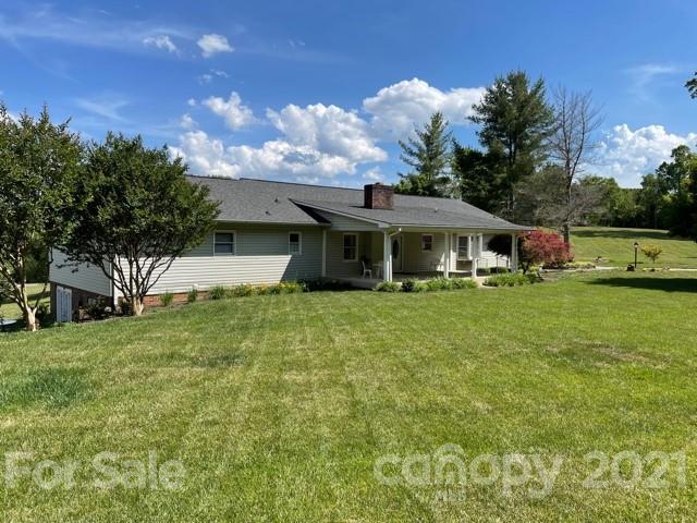 190 Hunting Drive Rutherfordton, NC 28139 - Photo 2 of 5 a front view of a house with garden
