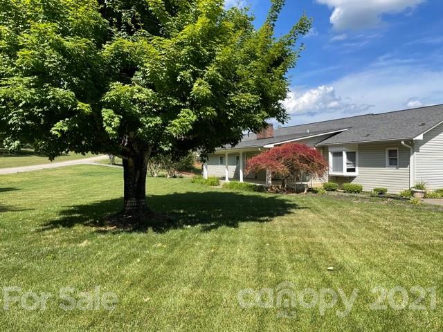 190 Hunting Drive Rutherfordton, NC 28139 - Photo 3 of 5 a view of a garden with a tree