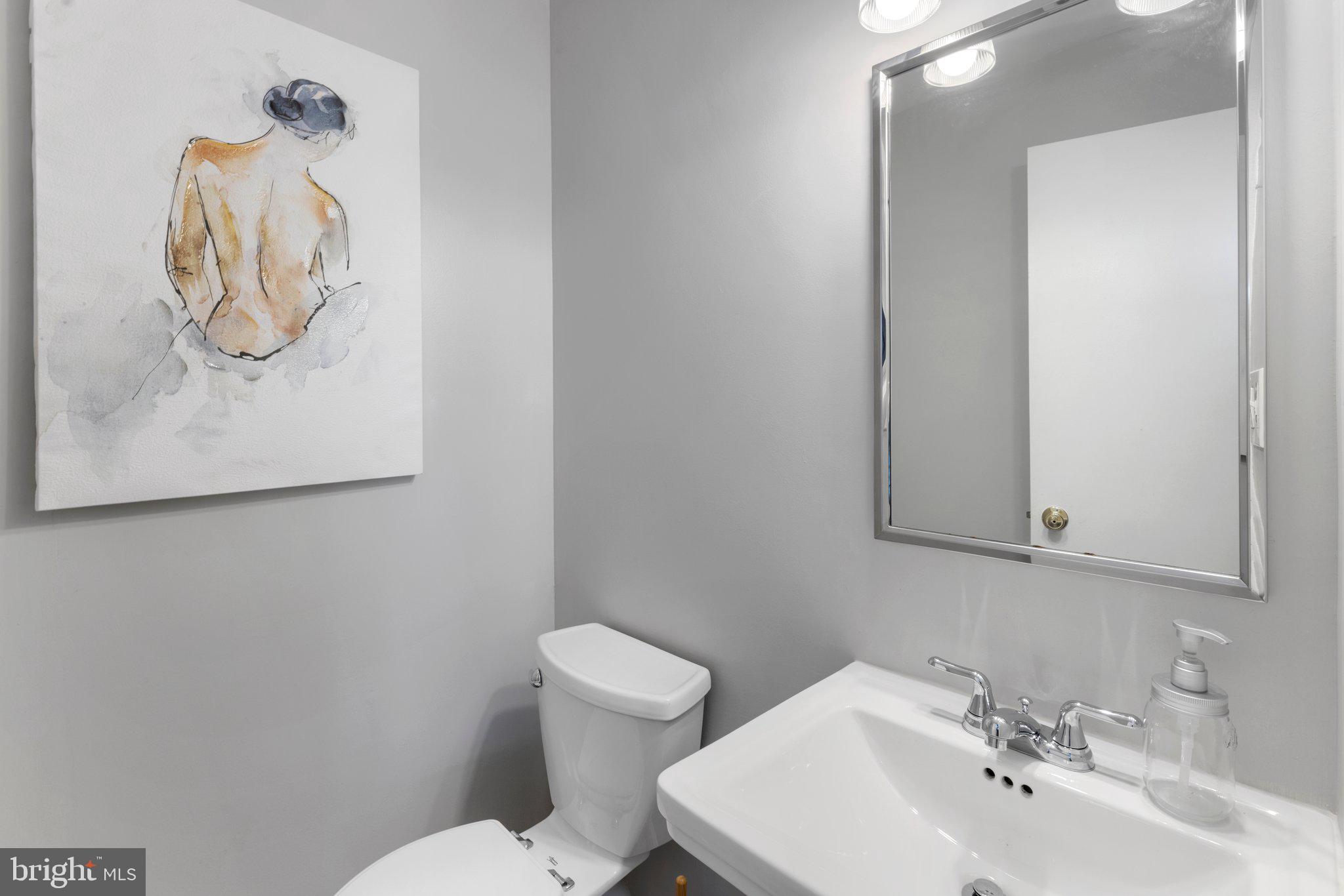 14201 Sturtevant Road Silver Spring, MD 20905 - Photo 27 of 53 Main level half bathroom