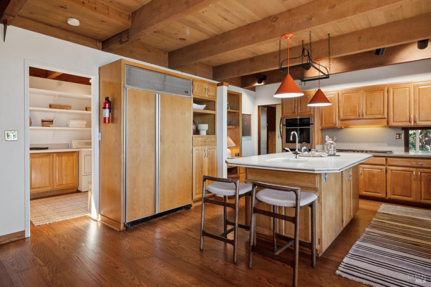 2490 Spanish Trail Road Tiburon, CA 94920 - Photo 16 of 32 a kitchen with stainless steel appliances granite countertop a sink and cabinets