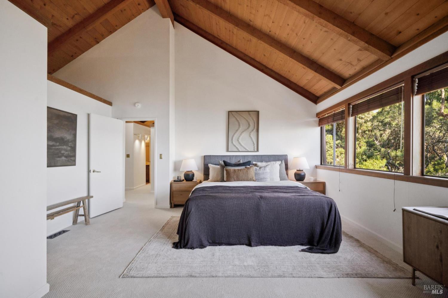 2490 Spanish Trail Road Tiburon, CA 94920 - Photo 20 of 32 a bedroom with a large bed and a large window