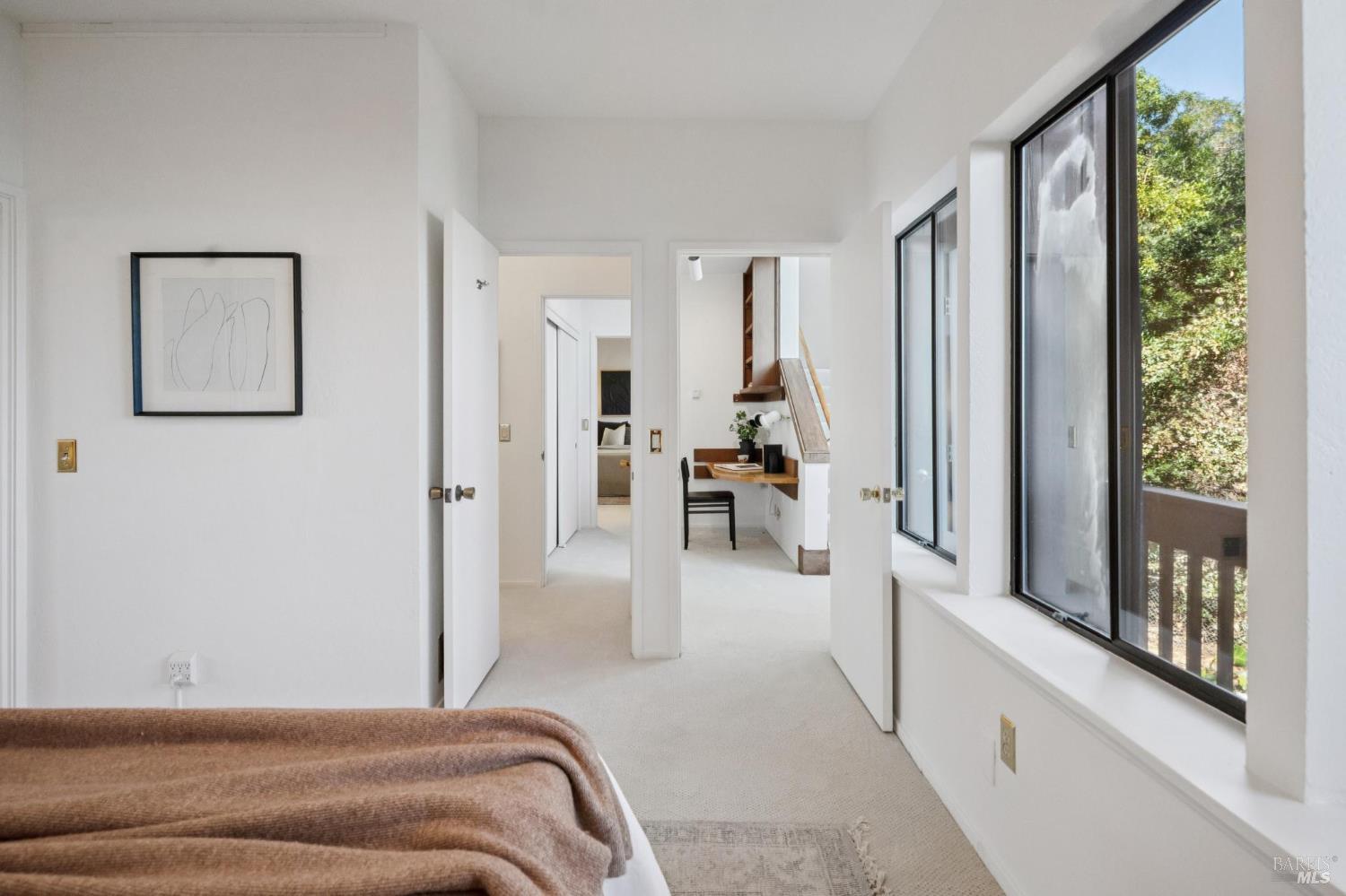 2490 Spanish Trail Road Tiburon, CA 94920 - Photo 24 of 32 a bedroom with a bed and a large window