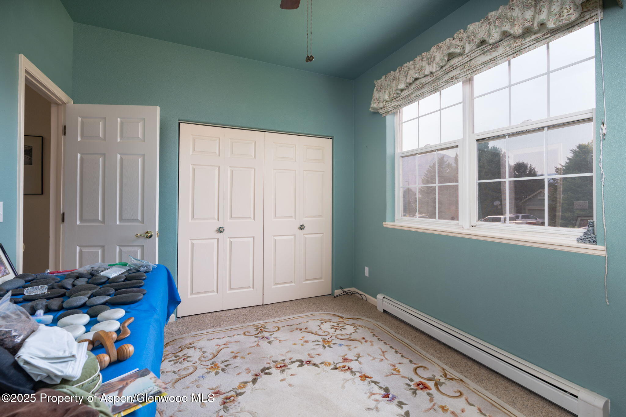72 Juniper Lane Battlement Mesa, CO 81635 - Photo 12 of 23 a bedroom with bed and a window