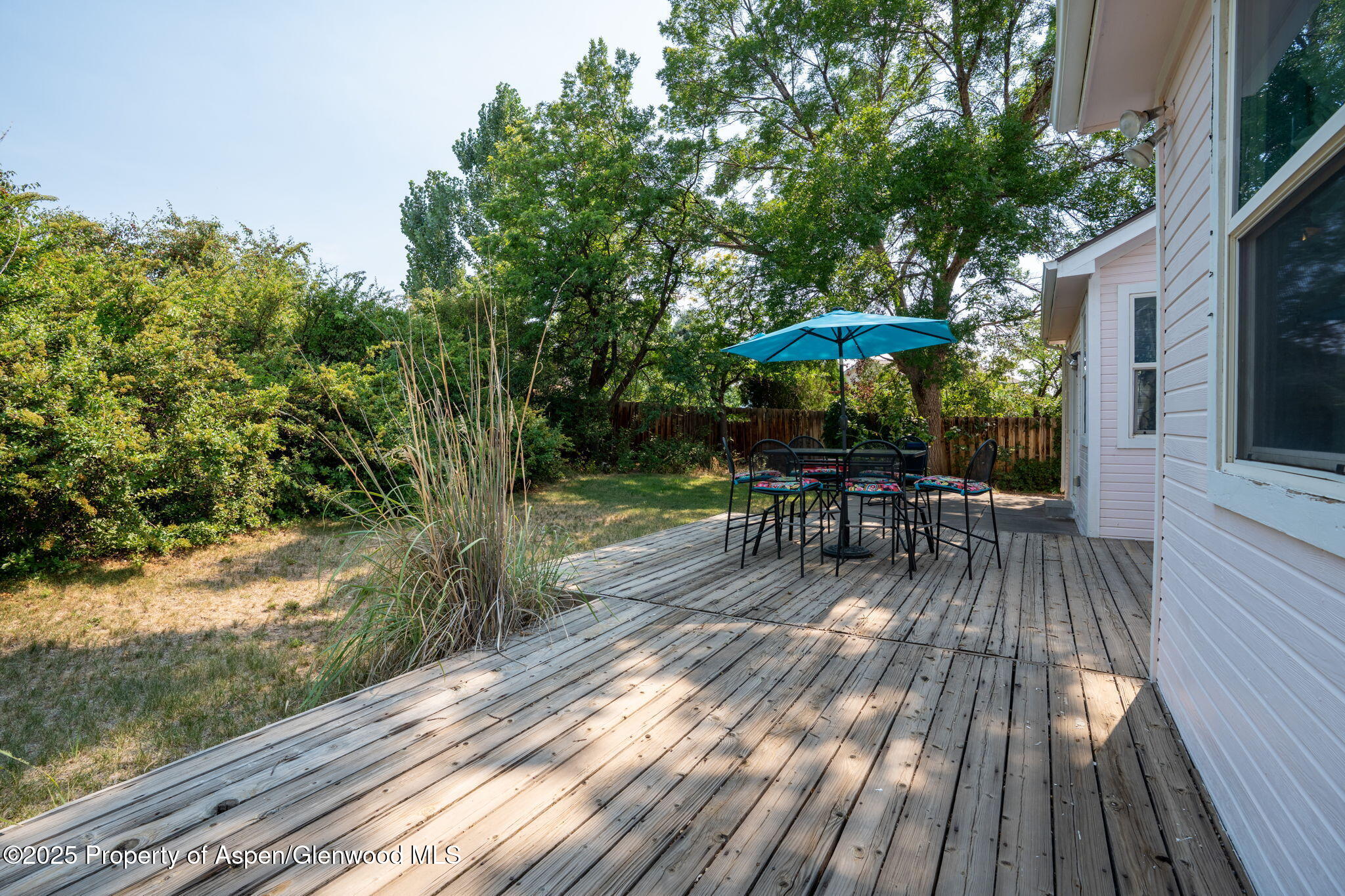 72 Juniper Lane Battlement Mesa, CO 81635 - Photo 18 of 23 a view of a table and chairs on roof deck