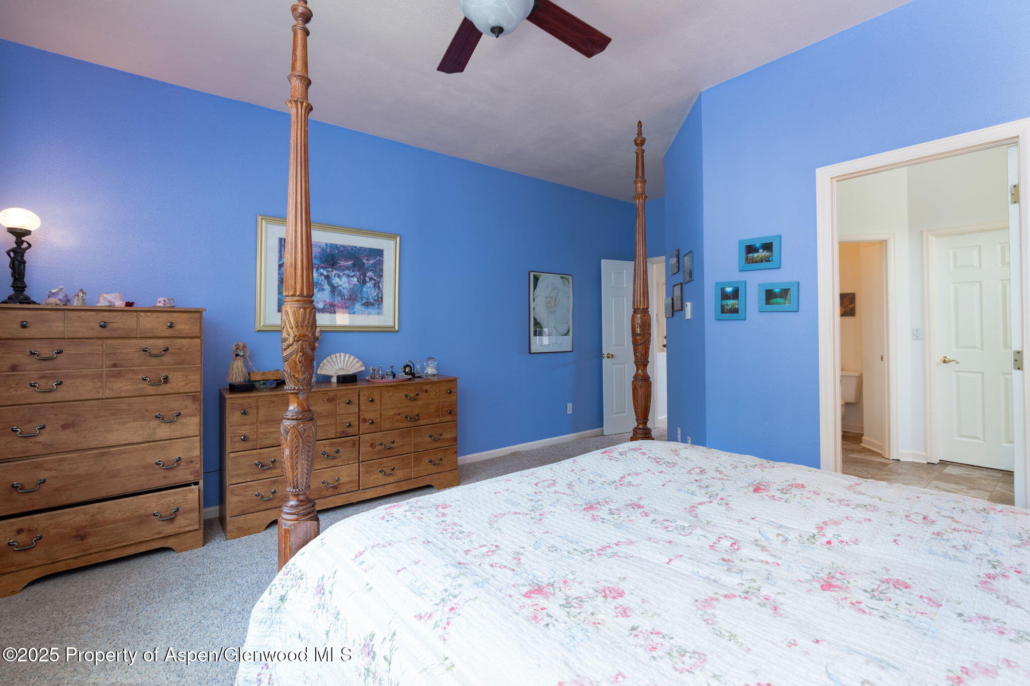 72 Juniper Lane Battlement Mesa, CO 81635 - Photo 10 of 23 a bedroom with a bed and a dresser
