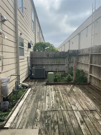 a view of a brick house with a yard