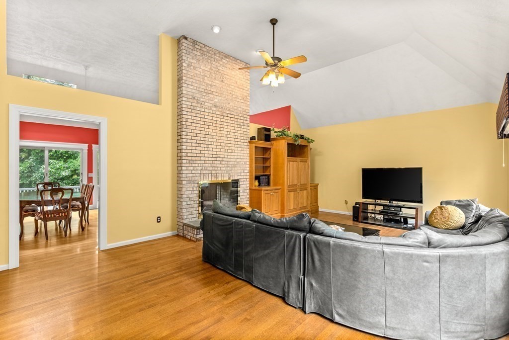 26 Fox Run Road Sudbury, MA 01776 - Photo 15 of 42 a living room with furniture and a flat screen tv