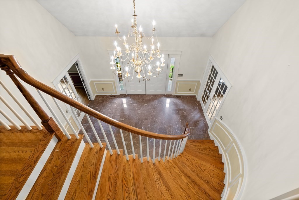 26 Fox Run Road Sudbury, MA 01776 - Photo 20 of 42 a view of a chandelier in a house