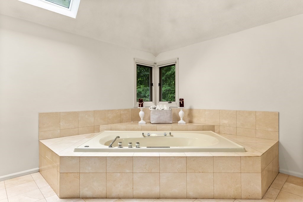 26 Fox Run Road Sudbury, MA 01776 - Photo 25 of 42 a bathroom with a sink and a mirror