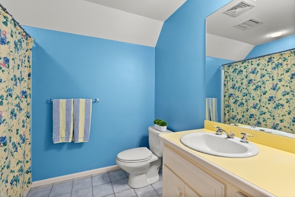 26 Fox Run Road Sudbury, MA 01776 - Photo 27 of 42 a bathroom with a sink and a mirror