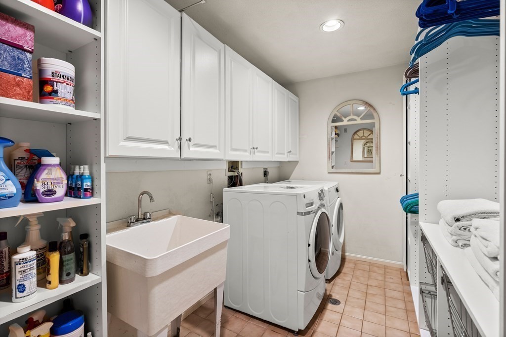 26 Fox Run Road Sudbury, MA 01776 - Photo 30 of 42 a utility room with sink dryer and washer